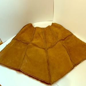 Suede poncho with pockets with pockets